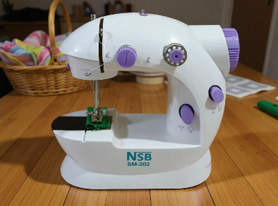 Picture of 5 in 1 Mini Sewing Machine Dual Speed Portable Mini Electric Pedal Double Threads Rewind Swing Machine-Multicolor