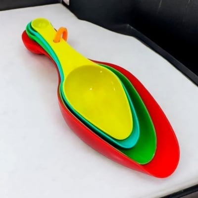 Picture of "1 Set of Multi-Color Measuring Spoons - 4-Piece Plastic with Small Pet Design for Baking Accuracy" - Multicolor
