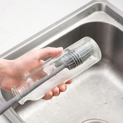 Picture of Silicone Bottle Cleaning Brush to thoroughly clean bottles, jars, and other containers.