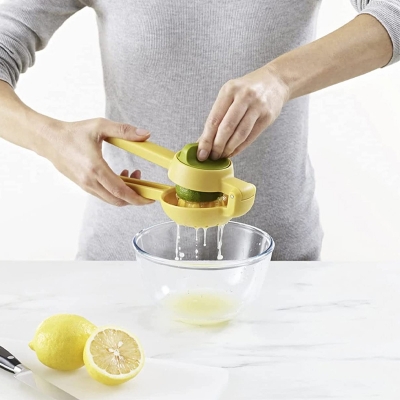 Picture of Effortless Twist & Squeeze Hand Juicer: Manual Lemon, Orange, Citrus, Fruit, and Vegetable Lime Squeezer