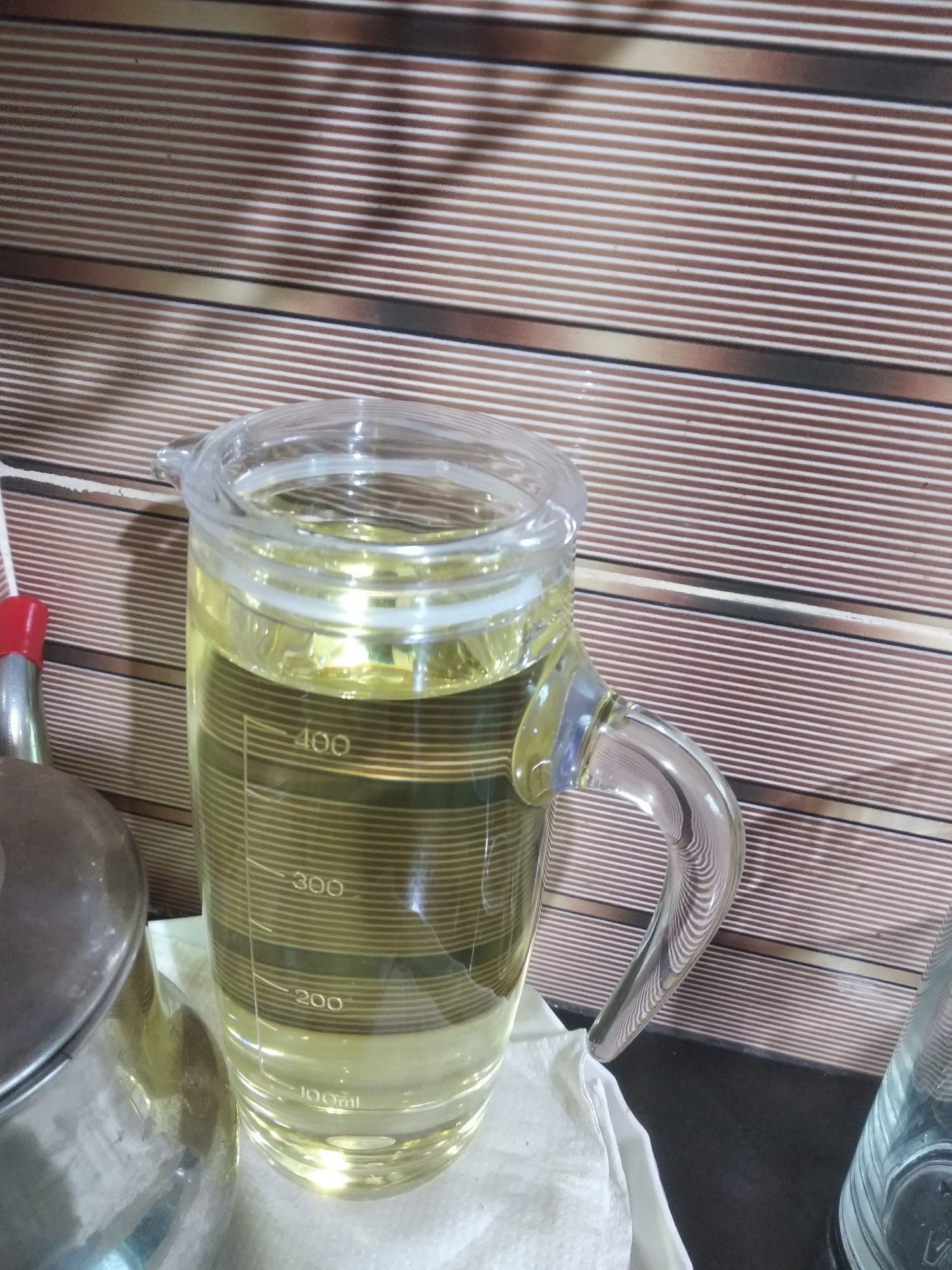 Picture of Acrylic Olive Oil can Transparent Jug Bottle Dispenser with Handle & Clear Lid (450 ml)  