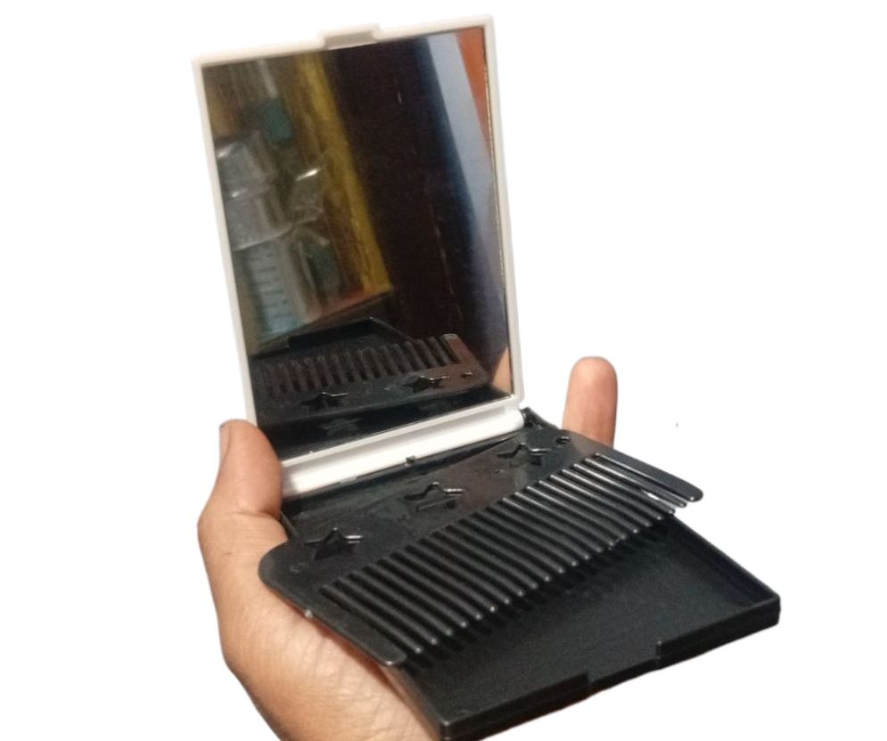 Picture of Travel Makeup mirror with comb Easy to carry anywhere, Built-in Mirror – Quick touch-ups anytime Multicolor 