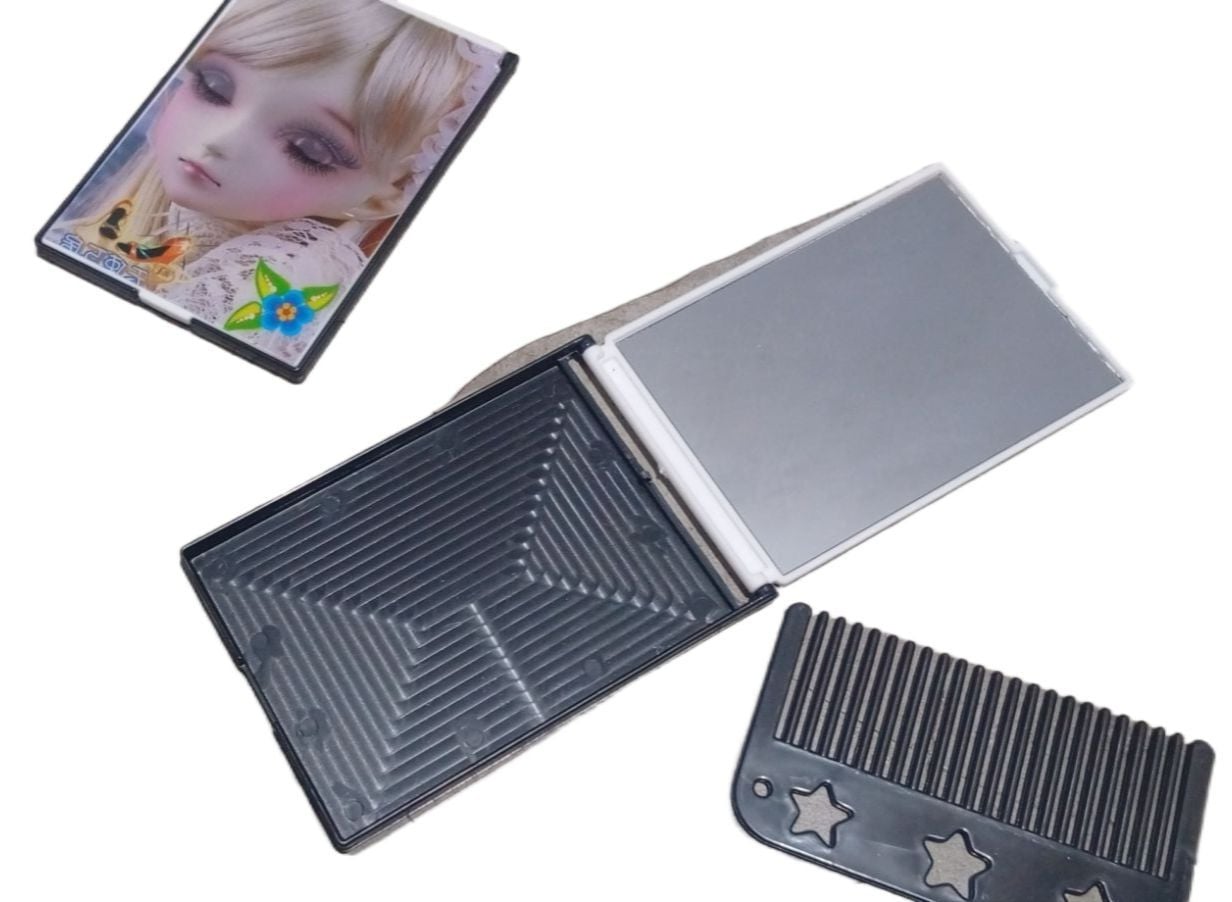Picture of Travel Makeup mirror with comb Easy to carry anywhere, Built-in Mirror – Quick touch-ups anytime Multicolor 