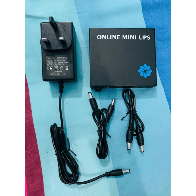 Picture of Online Mini UPS 6000mAh Powerful Battery Output 12V/12V/9V Long Backup Solution For Wifi Routers, Access Control, Ip Cameras, etc
