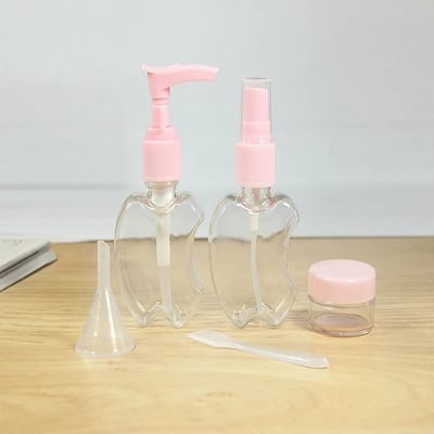 Picture of Travel Bottle Set Compact 5-Piece Travel Bottle Set for Toiletries TSA Approved Travel Container Leak-proof Refillable For shampoos lotions lotions shower gels creams (Pink)