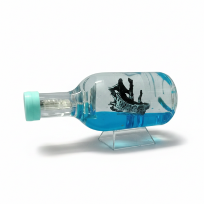 Picture of Wave Cruise Ship Decoration - Unsinkable Titanic Model in a Clear Motion Bottle for Stress Relief, Office or Home Desk Decor, Gift-Soothing Blue Liquid with Floating Ship Design (Blue)
