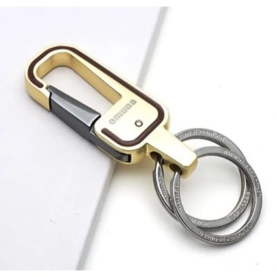 Picture of gold colour key chain for bike,car,house,office and others uses. 