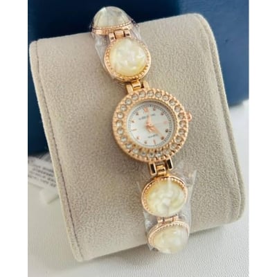 Picture of Titan Raga Power Pearls Quartz Analog Mother Of Pearl Dial faceted MOP Strap Watch for Women 95250WM01F -Brown