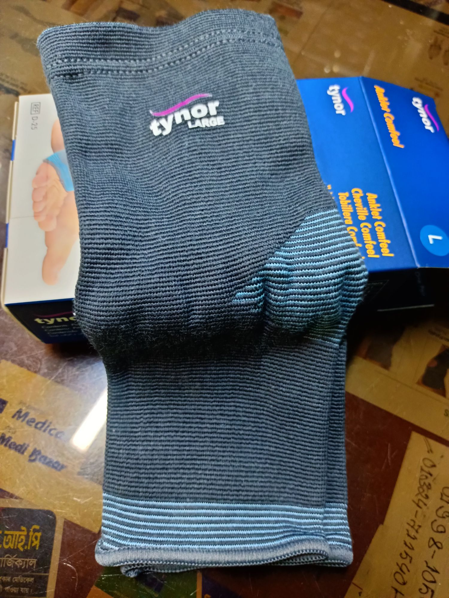 Picture of Tynor Anklet comfeel,(with adjustable ankle pain relief) Grey