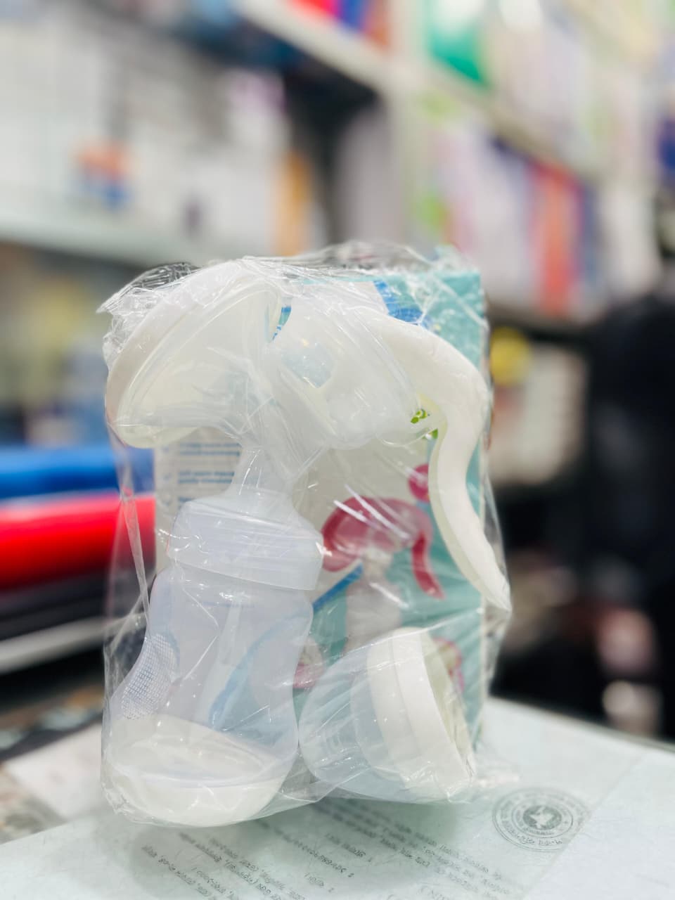Picture of Mother Care Manual Breast Pump & Feeding Bottle Multicolor