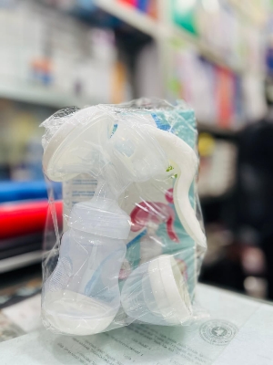 Picture of Mother Care Manual Breast Pump & Feeding Bottle Multicolor