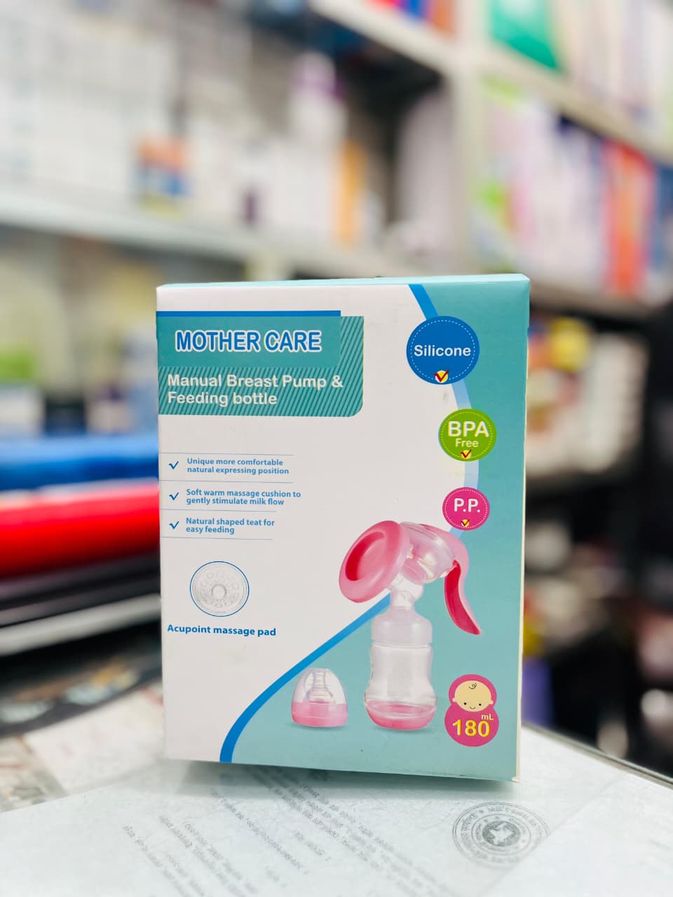 Picture of Mother Care Manual Breast Pump & Feeding Bottle Multicolor