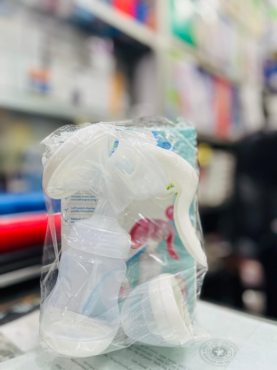 Picture of Mother Care Manual Breast Pump & Feeding Bottle Multicolor