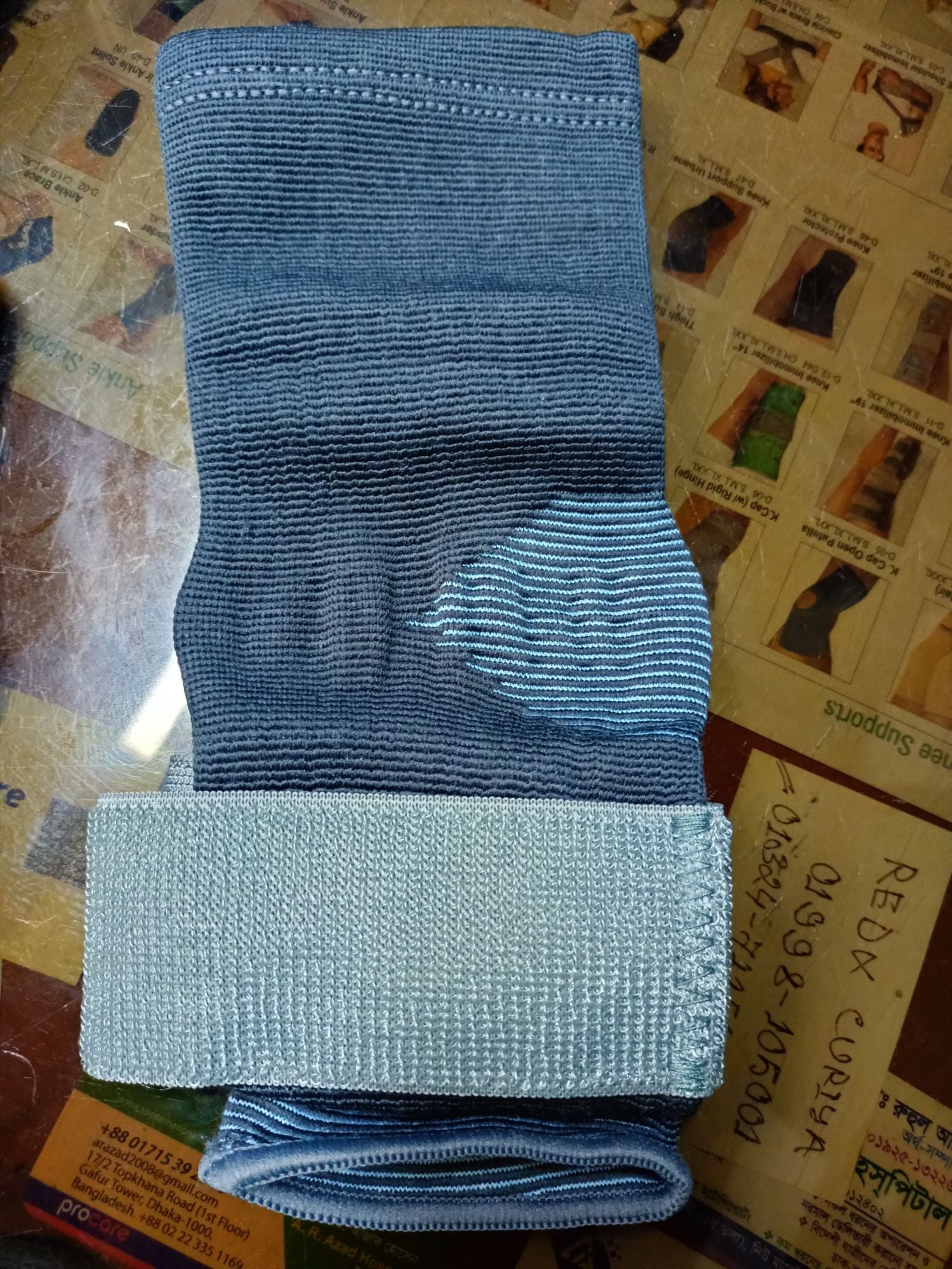 Picture of Tynor Ankle Binder (Dual grip, Closed heel, Anatomic shape, Four way stretch fabric, controlled compression) Grey