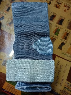 Picture of Tynor Ankle Binder (Dual grip, Closed heel, Anatomic shape, Four way stretch fabric, controlled compression) Grey