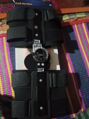Picture of Tynor Rom knee brace   with Knee Immobilization Adjustable  hinged brace Black