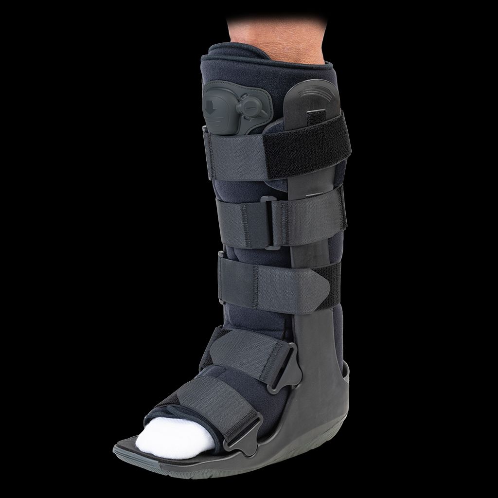 Picture of Walker Boot Tynor Wider Rocker Bottom promotes natural gait, reduces planter pressure and enhances stability. Broad, Strong foot casing provides full protection and rigid immobilization to ankle & foot. It stabilizes the foot, ankle and the lower leg Multicolor