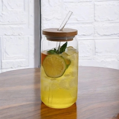 Picture of Glass Tumbler with Bamboo Lid & Glass Straw – 1 Pc Borosilicate Can Shaped Drinking Cup – Microwave Safe, Scratch Resistant – Ideal for Coffee, , Juice & More-Clear