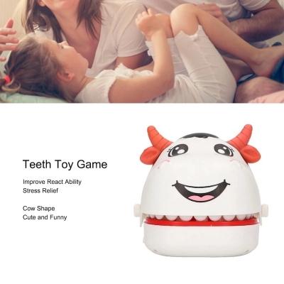 Picture of Cow-Shaped Push Teeth Game for Kids – Improve Reaction Time and Relieve Stress with This Funny Bite Finger Dentist Toy. Ideal for Parties, Travel, and Family Fun!-White