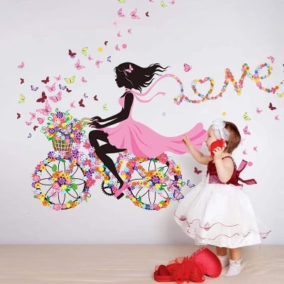 Picture of Girl Riding Bicycle with Butterfly Wall Sticker Wall Decal, Peel and Stick Removable Flower Fairy Wall Stickers for Kids Girls Nursery Bedroom (FlowerFairy on Bike)