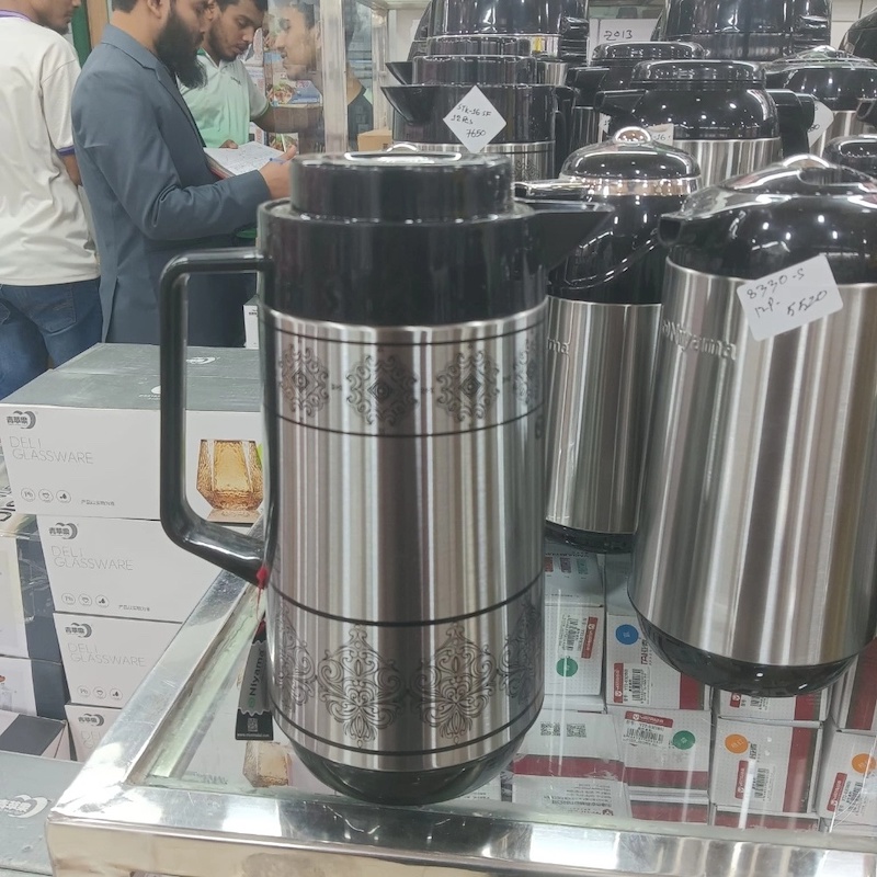 Picture of Niyyama 1L Flask - Leak-Proof, Double Wall Insulation, Silver Body, Glass Refill for Purity, Keeps Beverages Hot or Cold for 12-24 Hours, Eco-Friendly, Plastic Handle for Easy Carry-Multicolor
