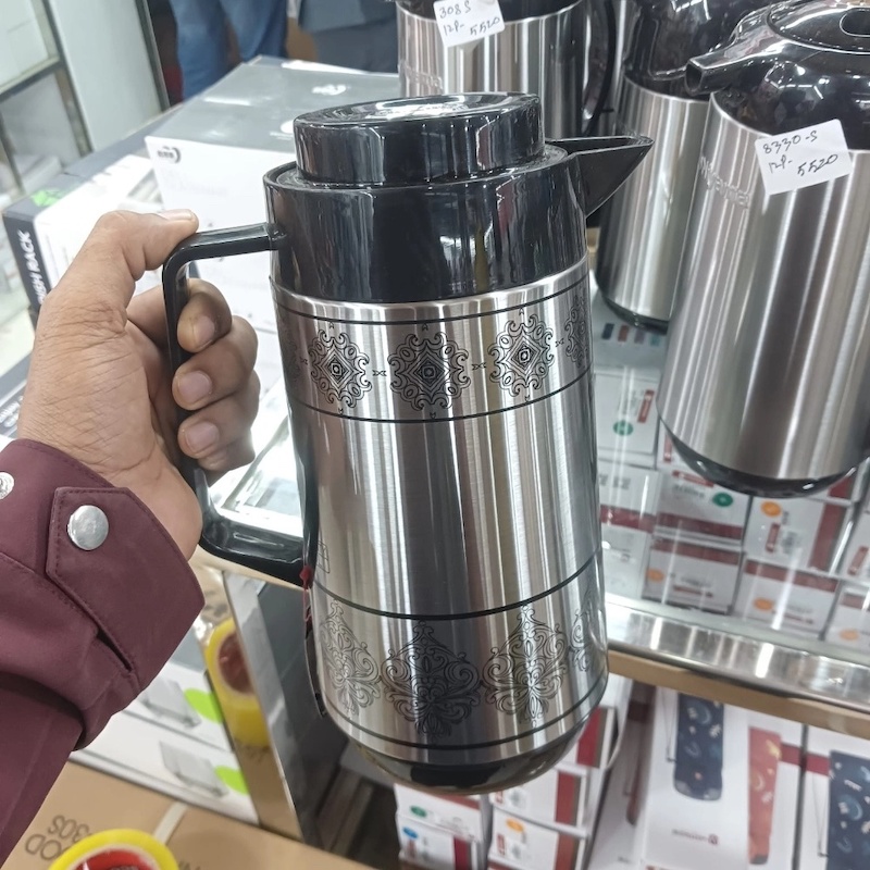 Picture of Niyyama 1L Flask - Leak-Proof, Double Wall Insulation, Silver Body, Glass Refill for Purity, Keeps Beverages Hot or Cold for 12-24 Hours, Eco-Friendly, Plastic Handle for Easy Carry-Multicolor