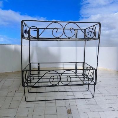 Picture of Black Metal Quran and Book Wall Shelf – 2 Layers with 3 Jainamaz Hangers – Ideal for Home or Mosque.