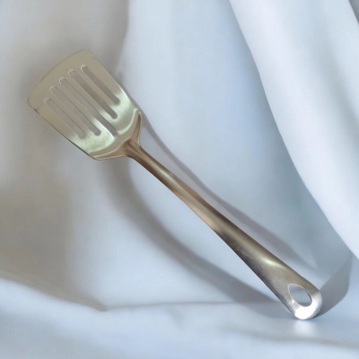 Picture of 10 Inch Slotted Turner Spoon, Silver Stainless Steel, Non-Magnetic. Ideal for Cooking and Serving, Combines Durability and Efficiency for Flipping and Serving Foods.-Silver