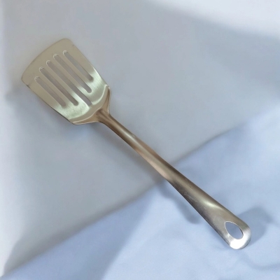 Picture of 10 Inch Slotted Turner Spoon, Silver Stainless Steel, Non-Magnetic. Ideal for Cooking and Serving, Combines Durability and Efficiency for Flipping and Serving Foods.-Silver