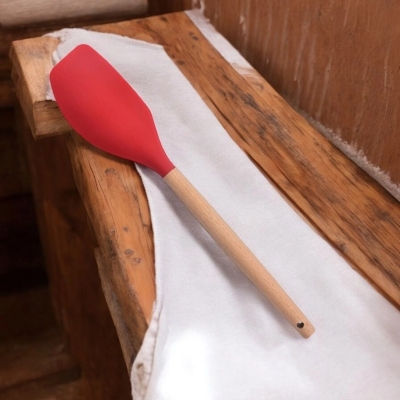 Picture of Wooden Handle Silicone Baking Spatula – Heat-Resistant & Non-Stick – Ideal for Mixing, Scraping, and Pastry Blending-Red