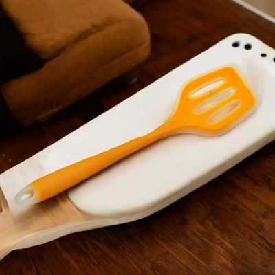 Picture of 12-Inch Multicolor Silicone Slotted Turner - Non-Stick Cooking Spoon with Full Silicone Build, High Heat Resistant - Perfect for Non-Stick Pots - 1 Piece-Orange