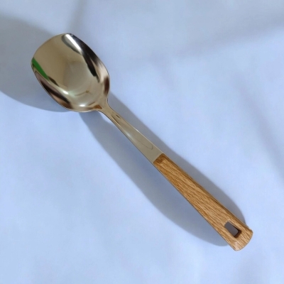Picture of 10 Inch Solid Turner Spoon, Silver Stainless Steel, Non-Magnetic. Features Wooden Color Cover Plastic Handle. Perfect for Cooking and Serving, Effortless Flipping in Any Kitchen.-Silver