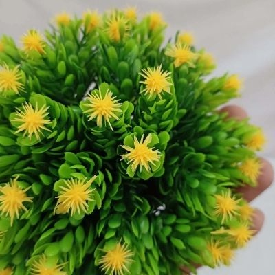 Picture of Perfect for home or restaurant, this 16cm Artificial Plants Grass with Flower and Vase is made of durable plastic in a stunning multicolor design. Quantity  1 pcs.-Multicolor
