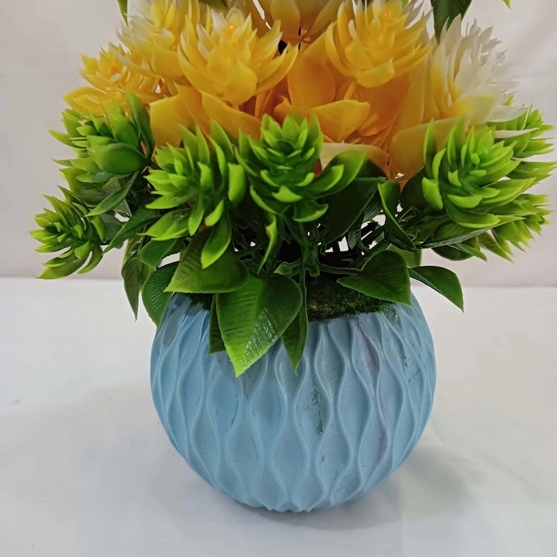 Picture of Vibrant 27cm Artificial Flower Plant with White Pot, made of durable multicolor plastic, perfect for home, hotel, or office decor. Quantity  1 pcs.-Multicolor