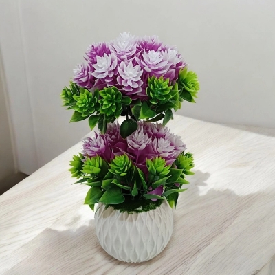 Picture of Enhance any space with this 27cm Artificial Flower Plant with White Pot, perfect for home, hotel, or office decor. Made of durable multicolor plastic. Quantity  1 pcs.-Multicolor