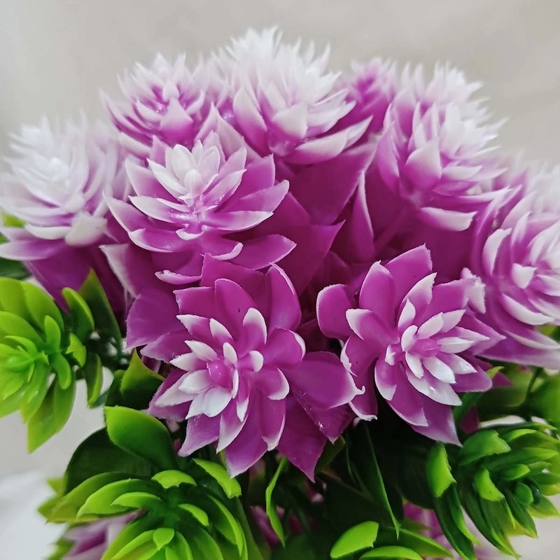 Picture of Enhance any space with this 27cm Artificial Flower Plant with White Pot, perfect for home, hotel, or office decor. Made of durable multicolor plastic. Quantity  1 pcs.-Multicolor