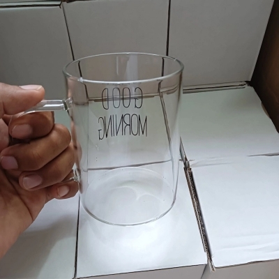 Picture of Clear Borosilicate Glass Cup - 450ml, Heat Resistant, Fireproof, Lightweight. Good Morning Printed. Ideal for Coffee, Tea, Milk, Juice, Yogurt. Eco-Friendly. Perfect for Hot & Cool Drinks. Party Gift. 1pc.-Clear