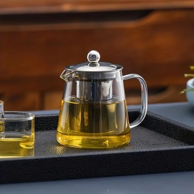 Picture of 1pc Thickened Glass Teapot, Heat Resistant Floral Tea Pot With Stainless Steel Filter, Suitable For Dishwasher, Perfect For Home Tea-Clear