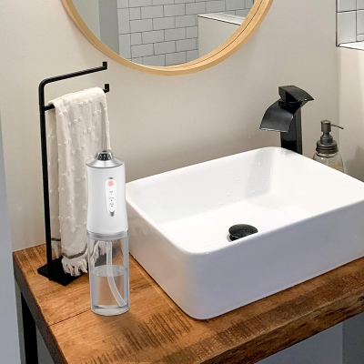 Picture of 220ml Electric Oral Irrigator Wireless, USB Rechargeable Dental Water Flosser with 4 Nozzles and 3 Pressure Modes, Teeth Cleaning and Whitening 4 Jet Tip IPX7 Waterproof Tooth Cleaner 