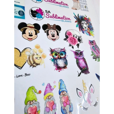 Picture of Costom UV DTF Stickers print. Long-lasting waterproof durable quality print.  make it with company logo or design of your own choice, which will make your product more attractive. Size 11*16 inchi Multicolor