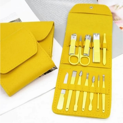 Picture of Portable 16-Piece Stainless Steel Manicure and Pedicure Set in a yellow case - Yellow