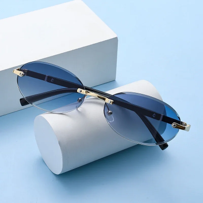 Picture of New Elegant Rimless UV400 Sunglasses for Men and Women, Classic Round Fashion Shades, Anti-Reflective Lens, Fashion Accessory