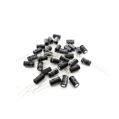 Picture of 10Pcs- RADIAL 100uF 25V Electrolytic Capacitors 100uF 25V Radial Polarized Aluminum Electrolytic Capacitor THT Electrolytic Radial Capacitors Electronics Circuitry & Parts