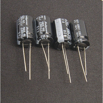 Picture of 5Pcs- RADIAL 22uF 250V Electrolytic Capacitors 22uF 250V Radial Polarized Aluminum Electrolytic Capacitor THT Electrolytic Radial Capacitors Electronics Circuitry & Parts