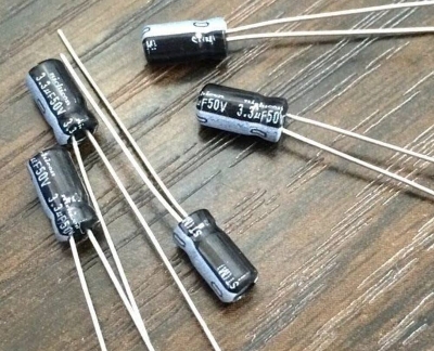 Picture of 20Pcs- 3.3uF 50V Capacitor Electrolytic Capacitor 3.3uF Capacitor 50V Radial Polarized Capacitor 2 Pin Leads 3.3uF 50V Capacitor