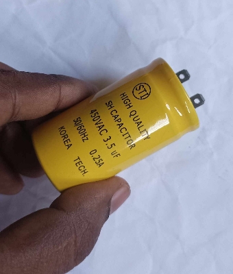 Picture of 3.5uF Fan Capacitor ORIGINAL 3.5uF Celling Fan Capacitor KOREA TECH High Quality 3.5uF 50Hz 60Hz 0.25A 450VAC Capacitor 2 Pin Leads 3.5uF Capacitor