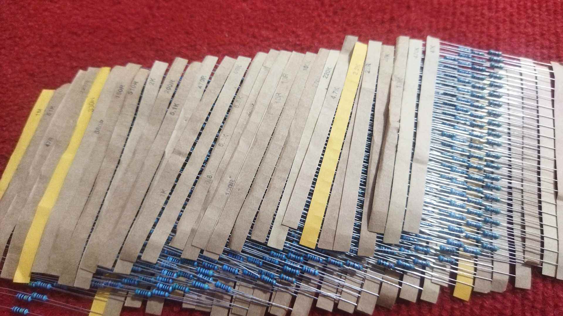 Picture of 600Pcs combo Tolerance 1% 1M 1K, 47K, 470K, 10K, 20K, 22OHM  30 Values Resistor Carbon Film Resistor 1/4W Resistance 0.25 Watt Fixed Resistors 2 Pin Leads With Storage Box