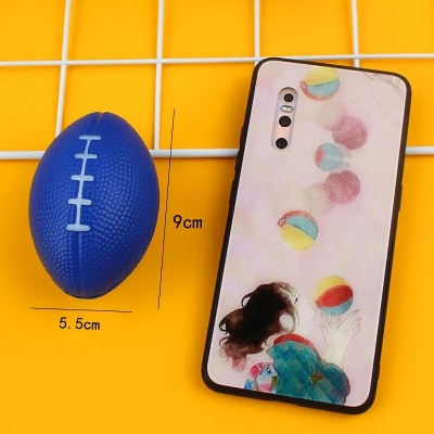 Picture of 12 piece Hand exercise rugby ball for relief from stress free Punch Ball , Squeeze ball soft ball - Multicolor
