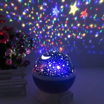 Picture of Star Master Rotating Sky Night Light Projector – Star And Moon Table Lamp-Multicolor
