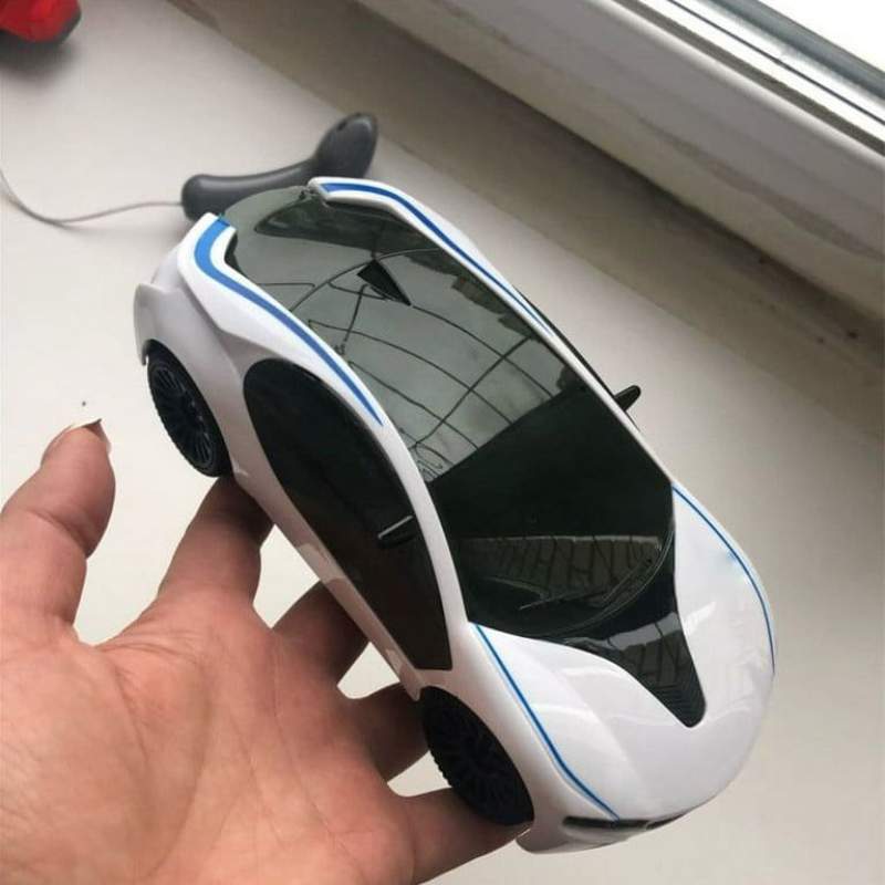 Picture of Sports Car Toy - Light-Up Toy Cars for Kids Toddlers Boys Girls Age 2 3 4-6 Year Old 360° Rotation Car Christmas Gift - Electric Car with Bright Flashing 4D Lights & Sound - White